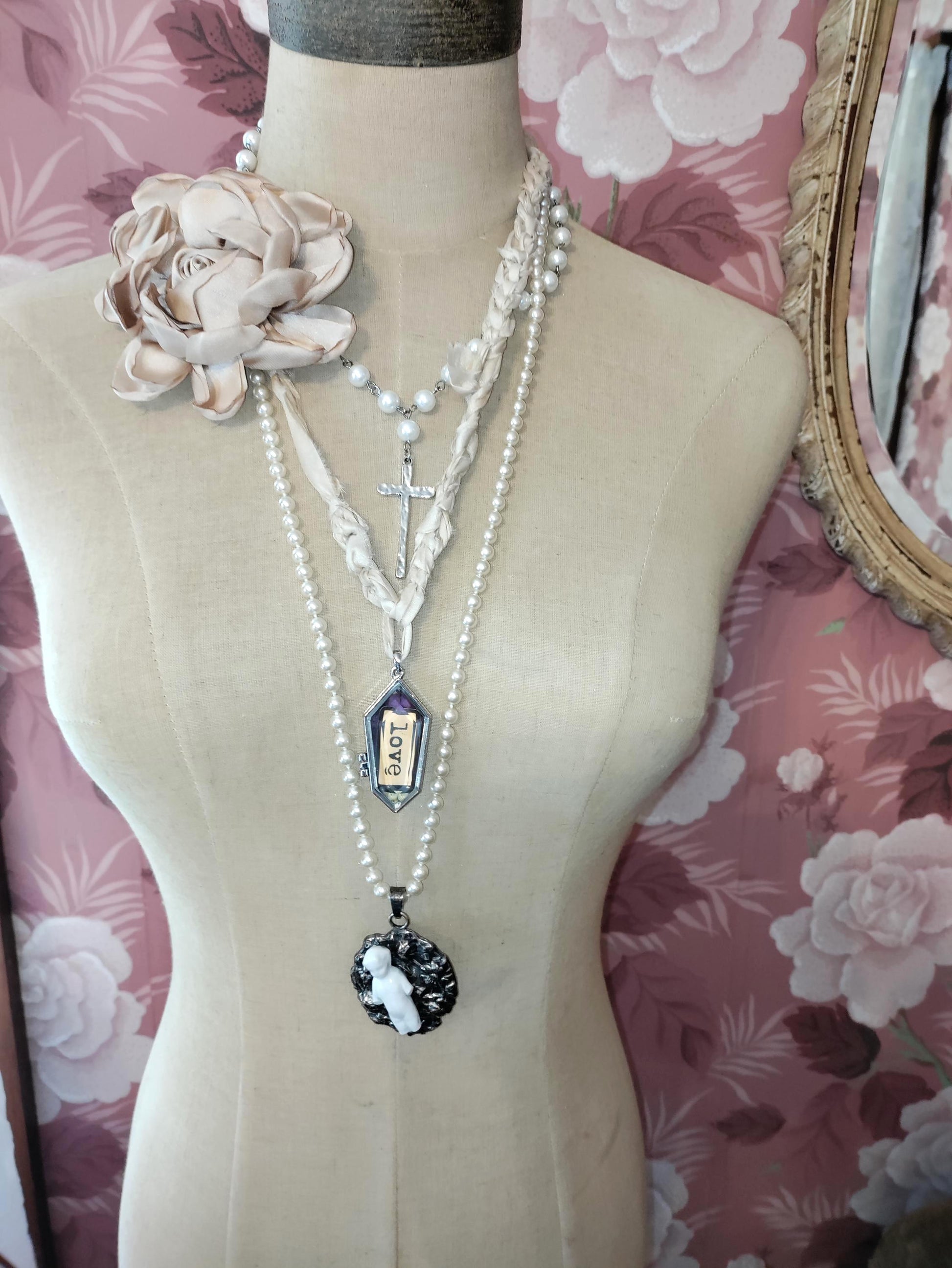 Victorian Frozen Charlotte Doll Necklace: vintage Pearls, Coffin pendant with Roses and the word Love.