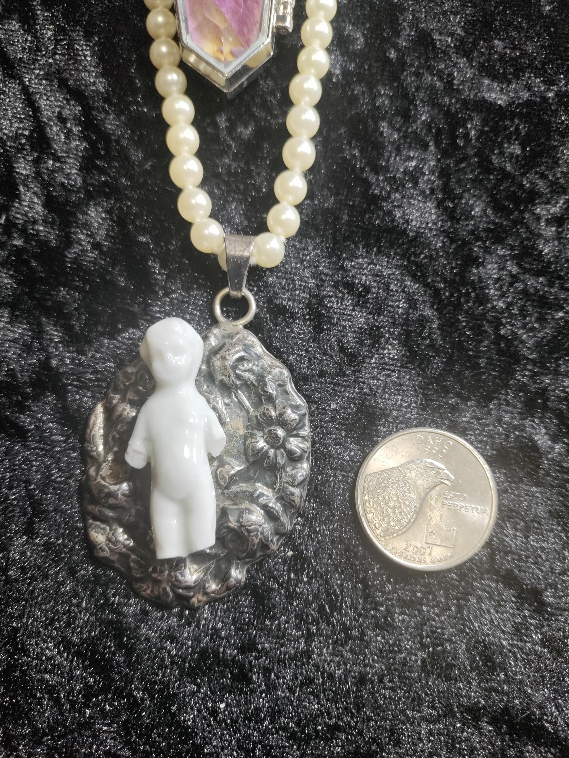 Victorian Frozen Charlotte Doll Necklace: vintage Pearls, Coffin pendant with Roses and the word Love.