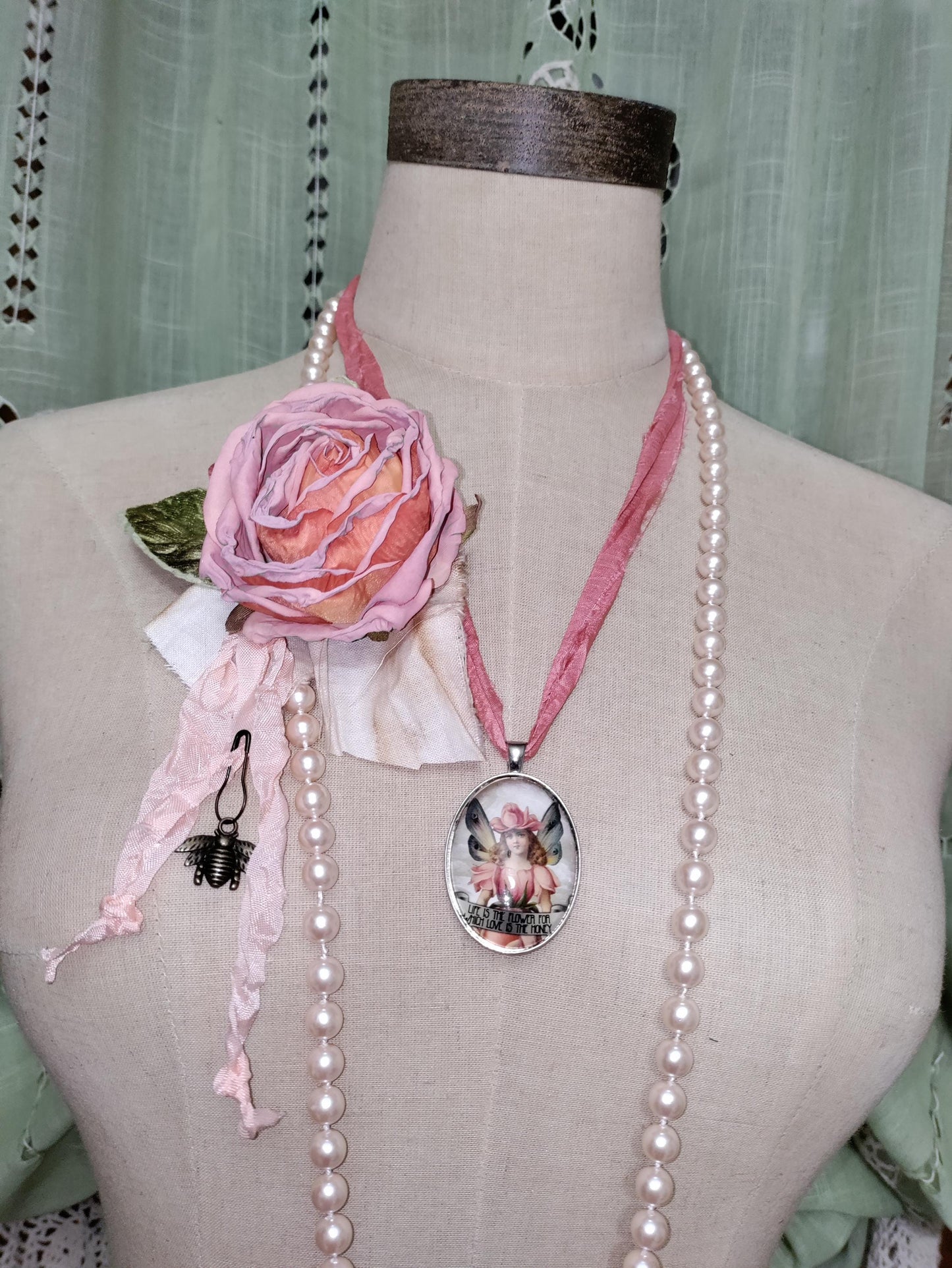 Handcrafted Fairy Pendant, with light peach Vintage Pearls and a Handcrafted Floral Brooch.