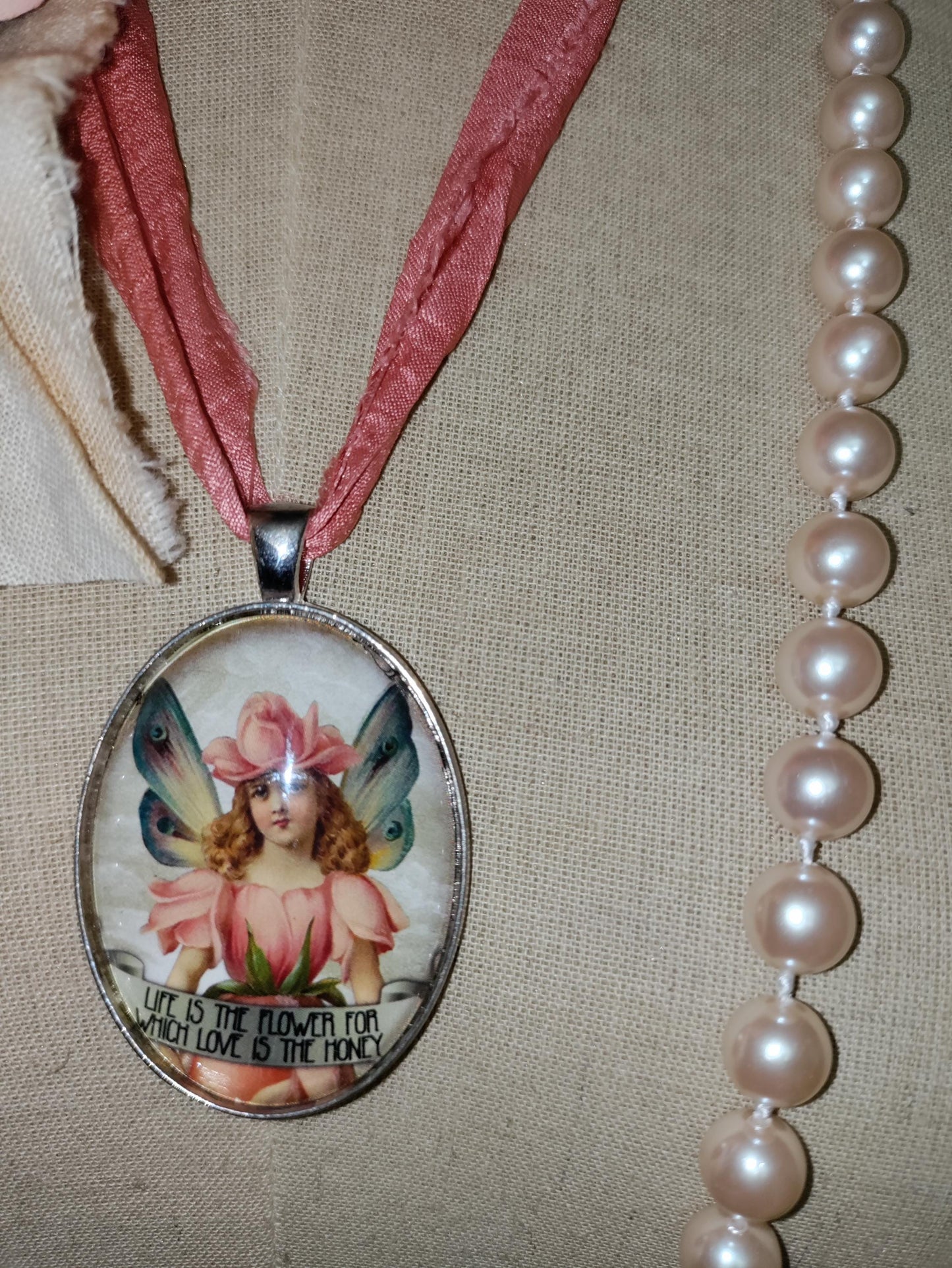 Handcrafted Fairy Pendant, with light peach Vintage Pearls and a Handcrafted Floral Brooch.