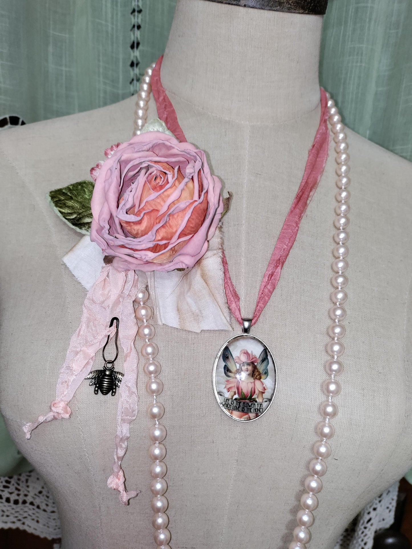 Handcrafted Fairy Pendant, with light peach Vintage Pearls and a Handcrafted Floral Brooch.