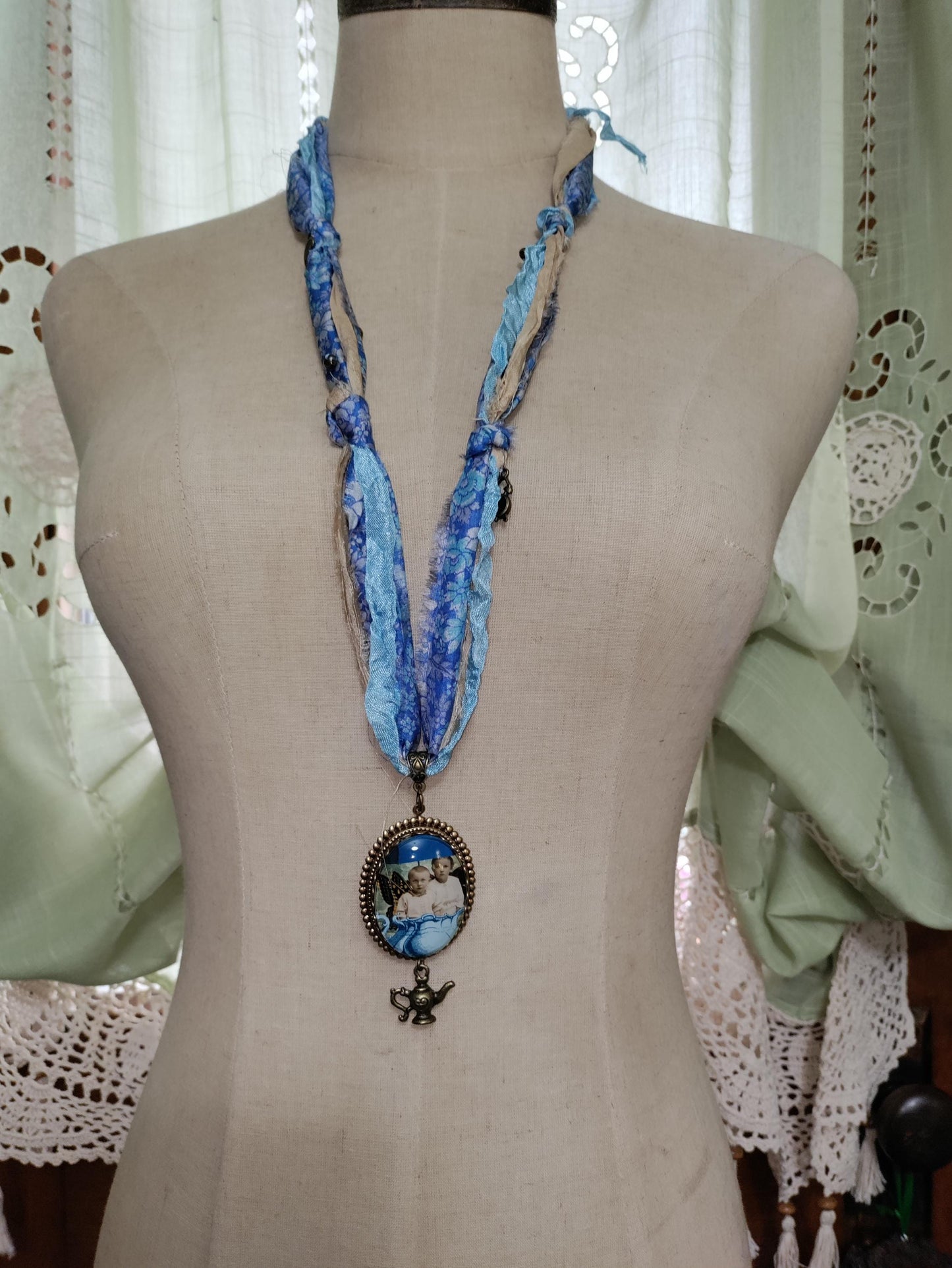 Tea Time with Fairies. Vintage photo pendant with butterfly wings.