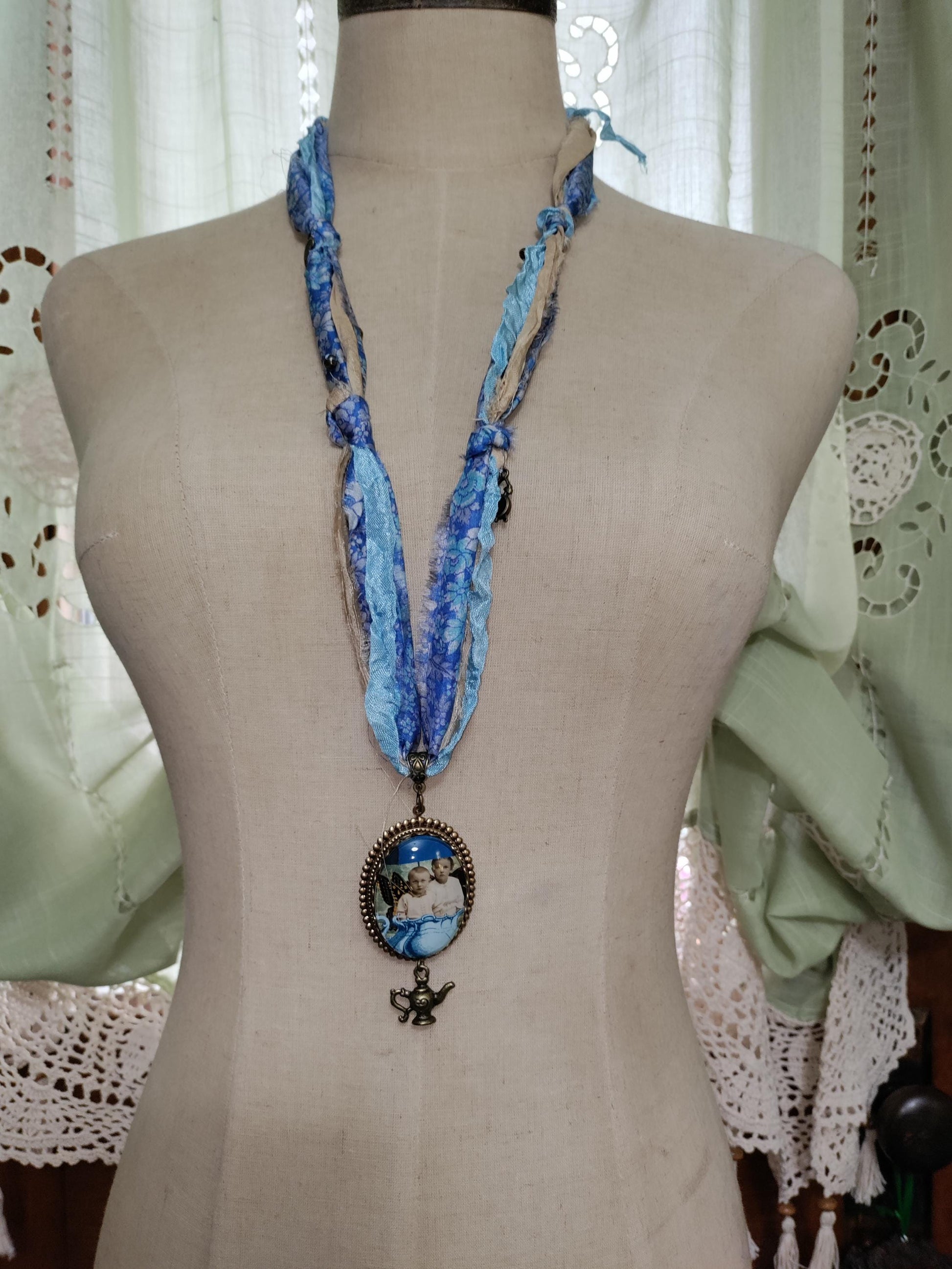 Tea Time with Fairies. Vintage photo pendant with butterfly wings.
