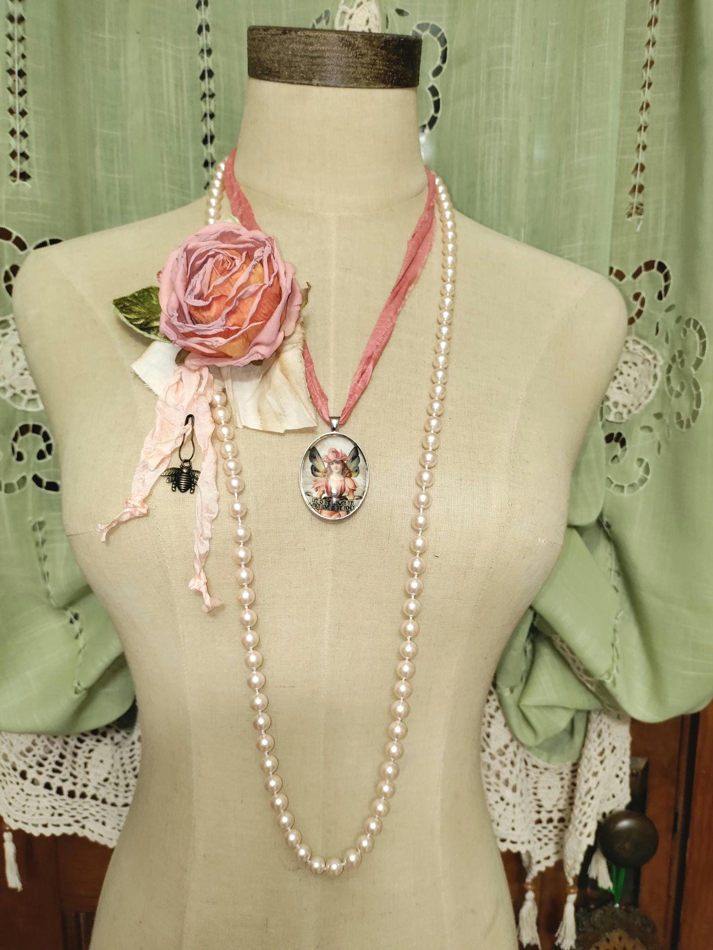 Handcrafted Fairy Pendant, with light peach Vintage Pearls and a Handcrafted Floral Brooch.